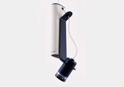 El sensor EH Node de EcoHero visto de lado sobre fondo blanco, con el cuerpo claro y la lente azul marino
